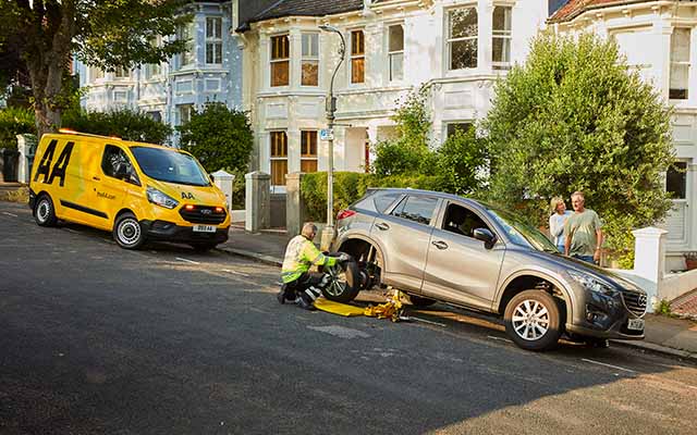 AA Patrol replacing car tyre