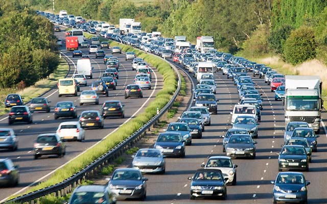 Motorway queue facing camera