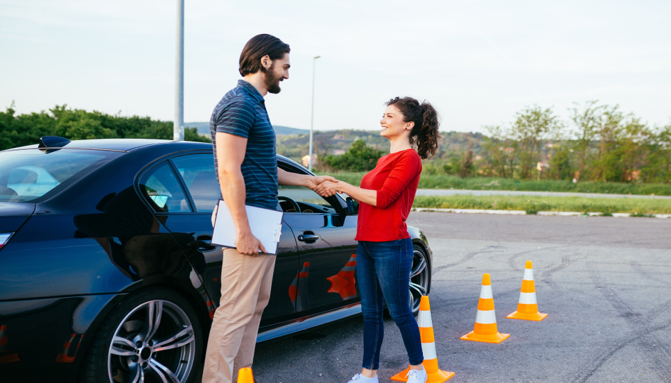 An image representing a person undertaking their practical driving test